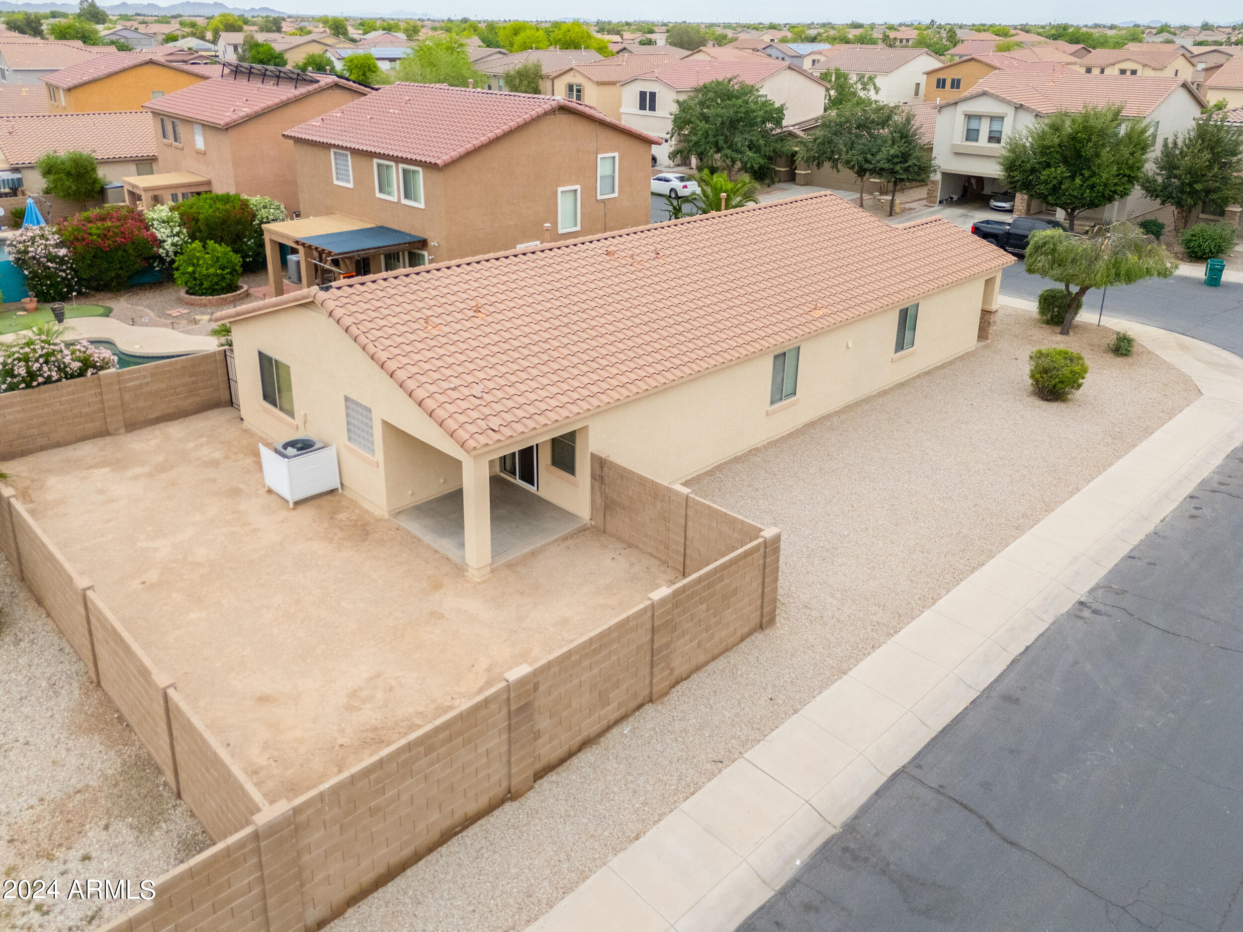 44236 Roth Road Maricopa, AZ 85138 - Photo 39 of 45 an aerial view of a house with swimming pool