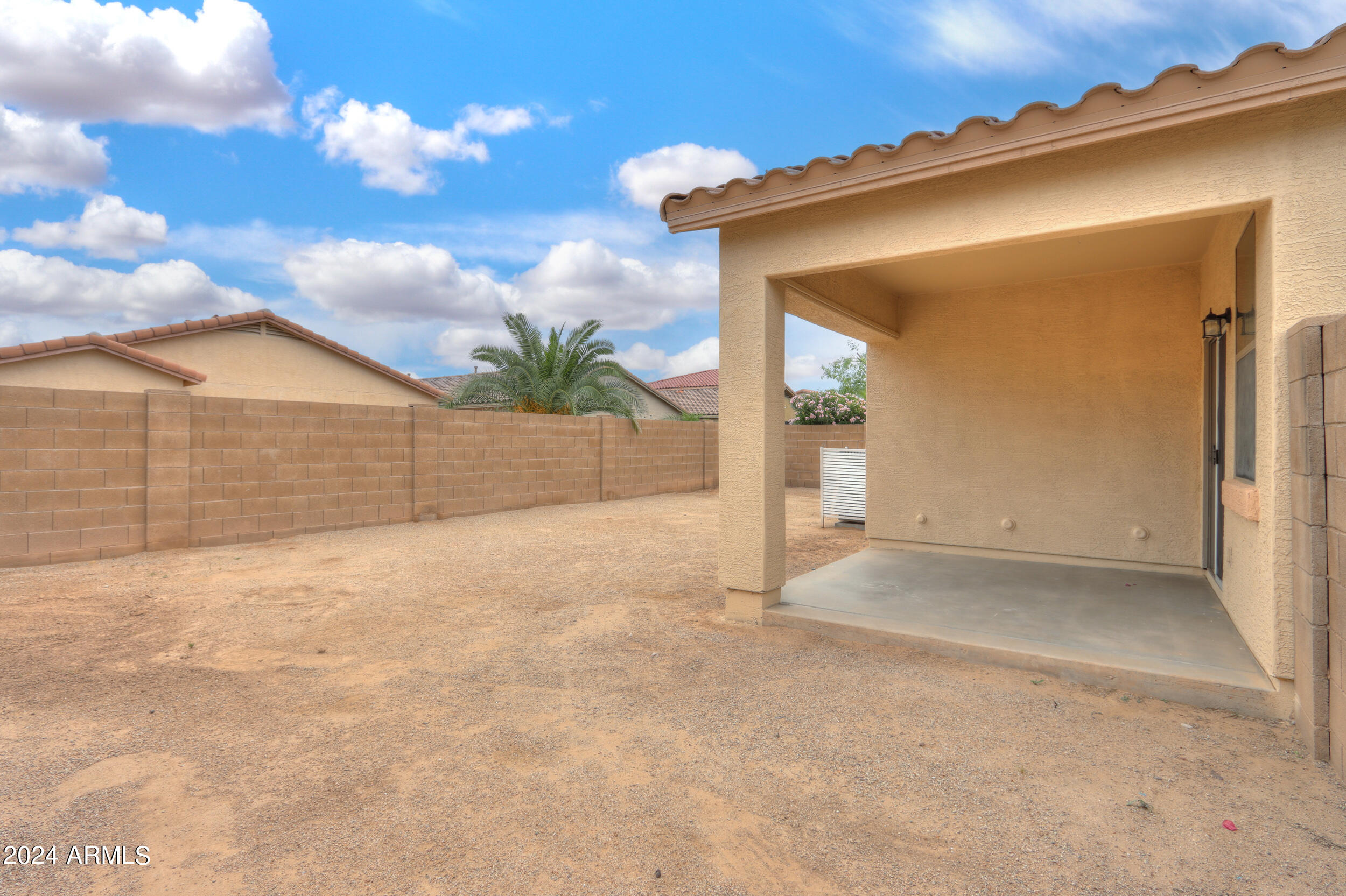 44236 Roth Road Maricopa, AZ 85138 - Photo 42 of 45 a view of a house with a backyard