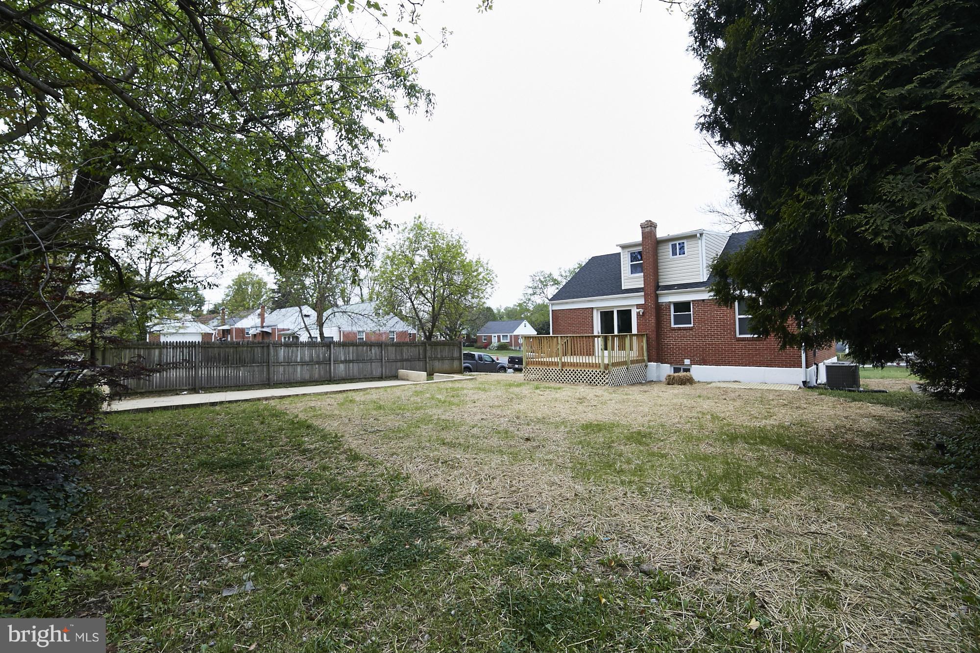 719 Cliffedge Road Baltimore, MD 21208 - Photo 30 of 30 a house view with a garden space