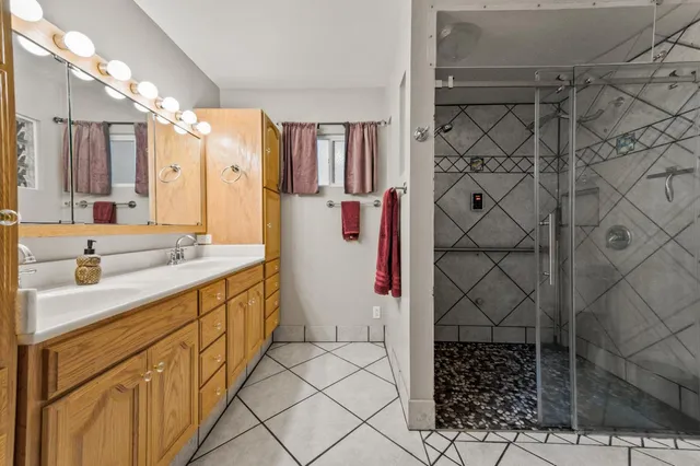a view of a house with backyard porch and sitting area