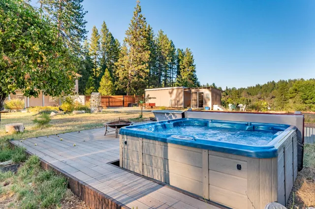 a view of a garden with a fountain
