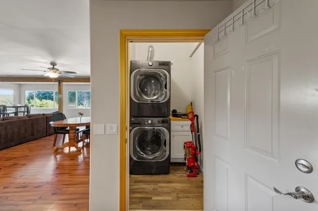 a view of yard with swimming pool and seating
