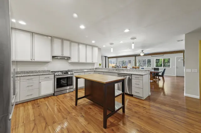a bathroom with a sink and a shower