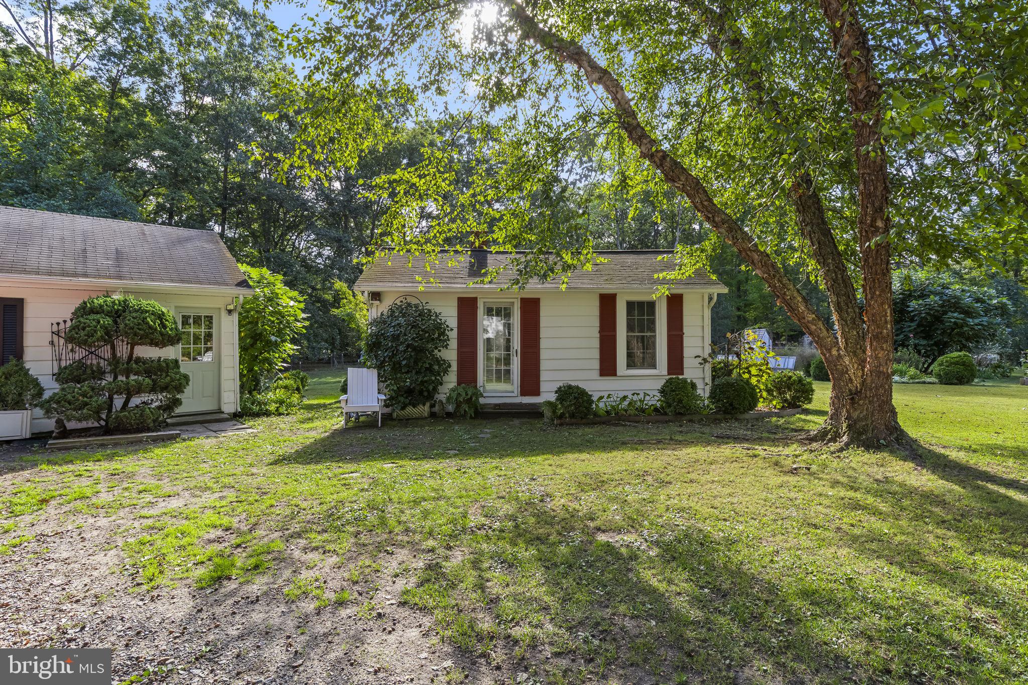 8150 Fairground Road La Plata, MD 20646 - Photo 14 of 100 a view of a house with a yard and a tree