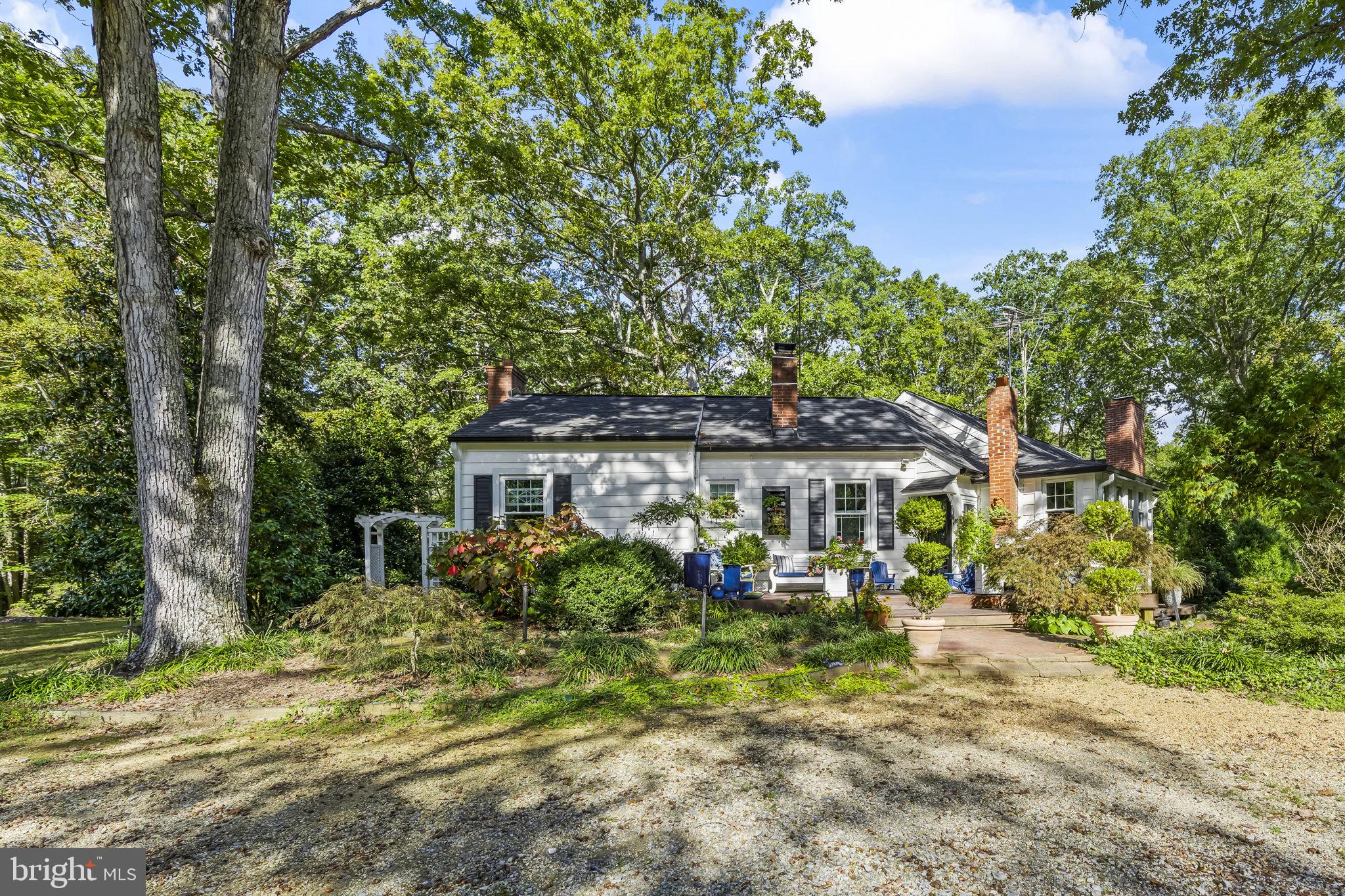 8150 Fairground Road La Plata, MD 20646 - Photo 23 of 100 front view of a house with a garden