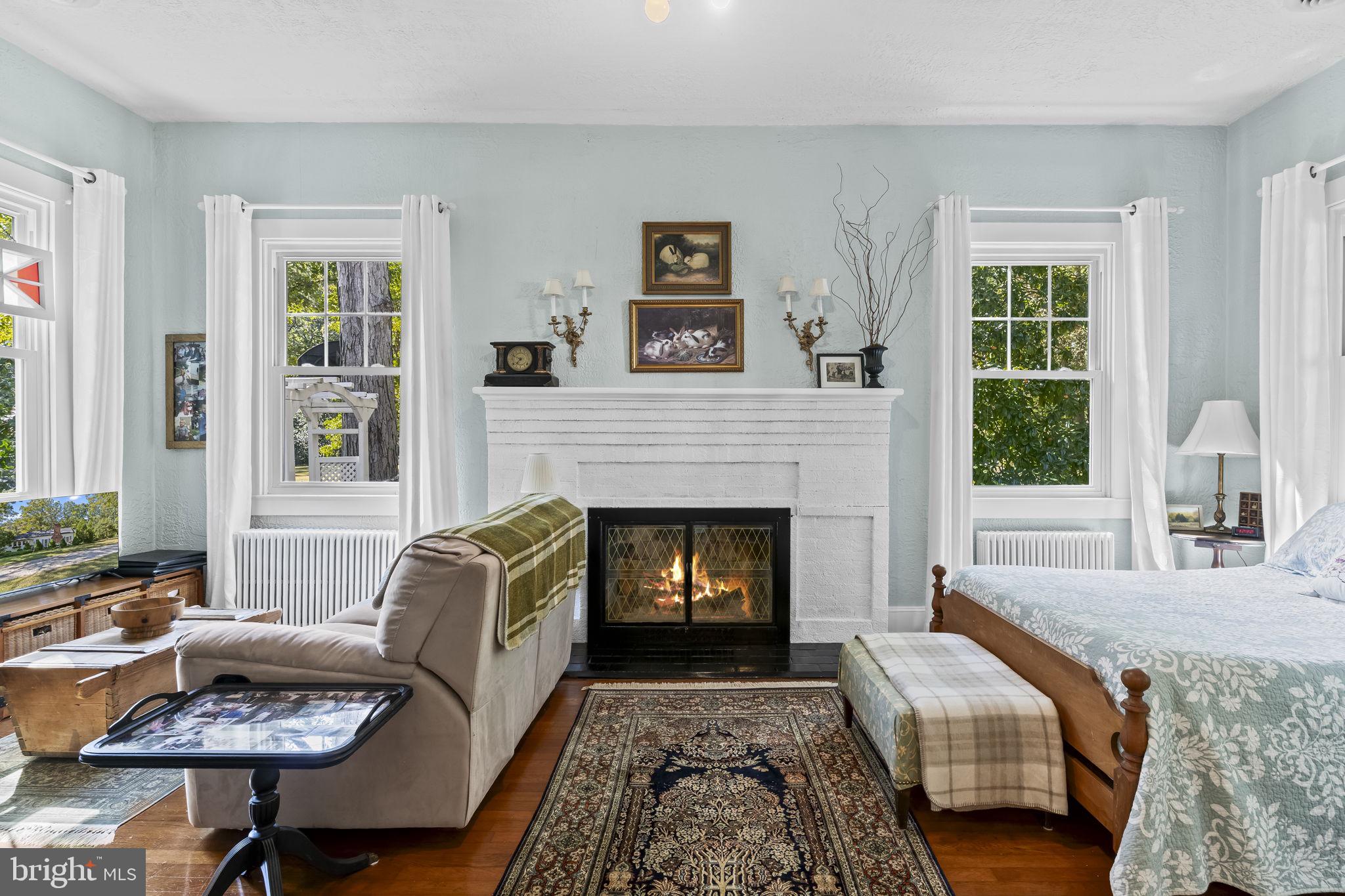 8150 Fairground Road La Plata, MD 20646 - Photo 71 of 100 a living room with furniture and a fireplace