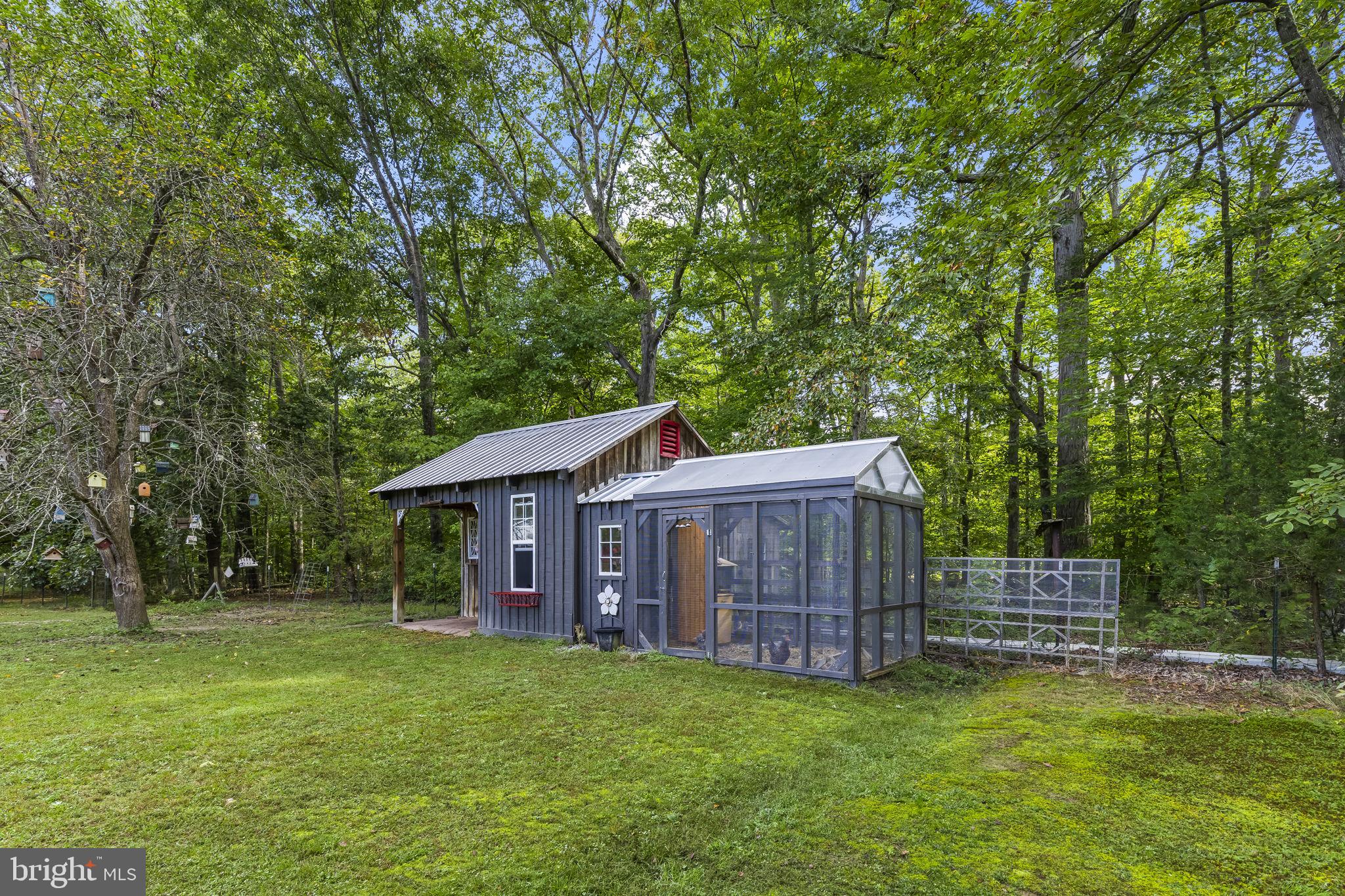 8150 Fairground Road La Plata, MD 20646 - Photo 81 of 100 a view of a house with a yard and deck