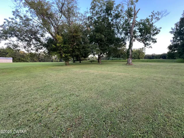 a view of outdoor space with trees