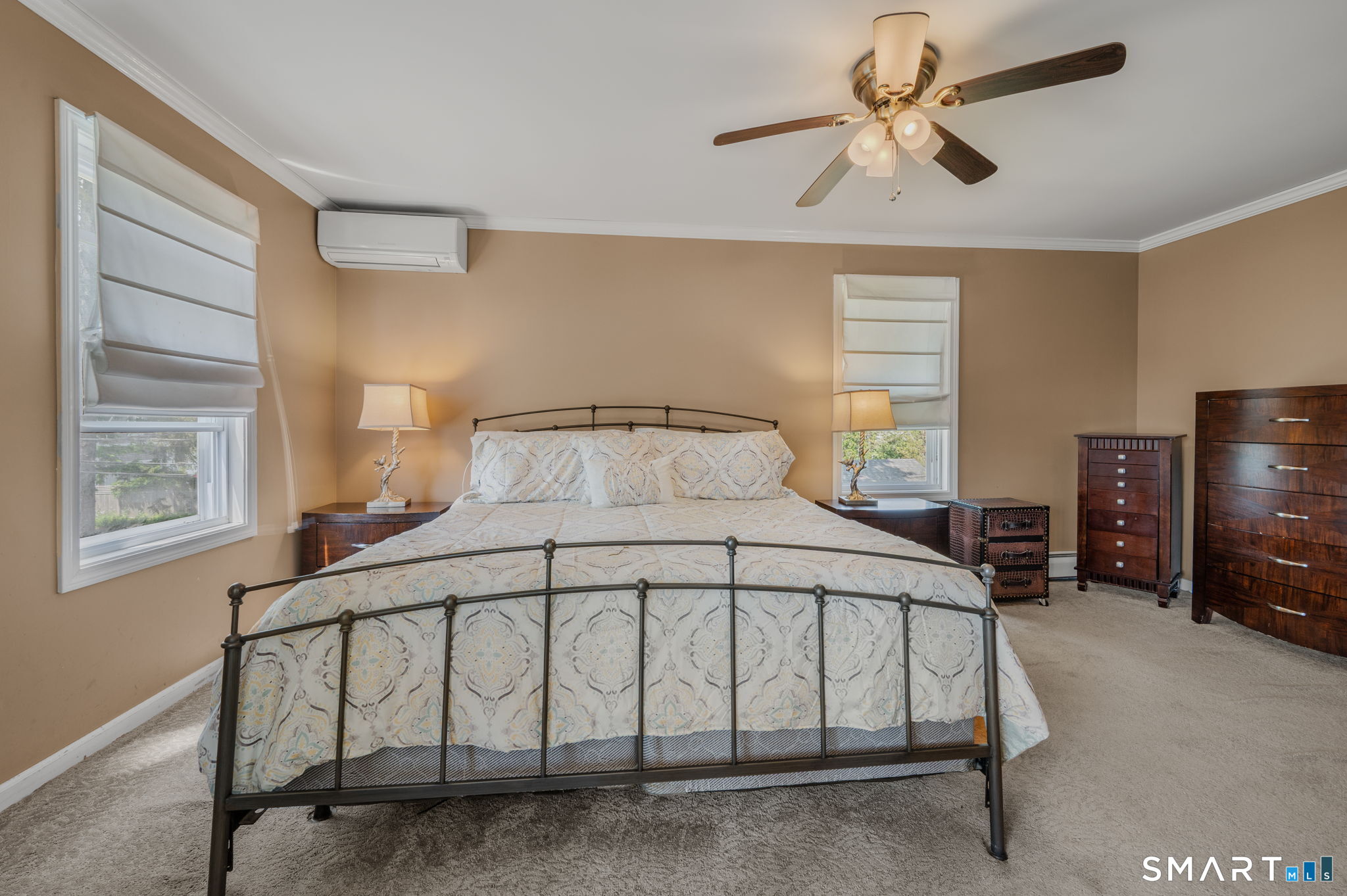 212 R Shore Road Waterford, CT 06385 - Photo 27 of 28 a bedroom with a bed window and a flat tv screen