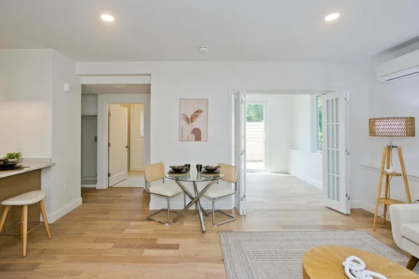 a living room with furniture and a table