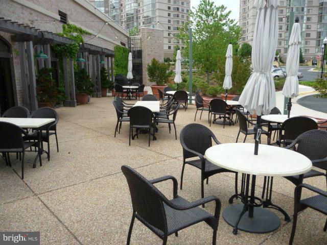 19355 Cypress Ridge Terrace, Unit 1003 Leesburg, VA 20176 - Photo 21 of 29 RESTAURANT PATIO, COOK OUTS
