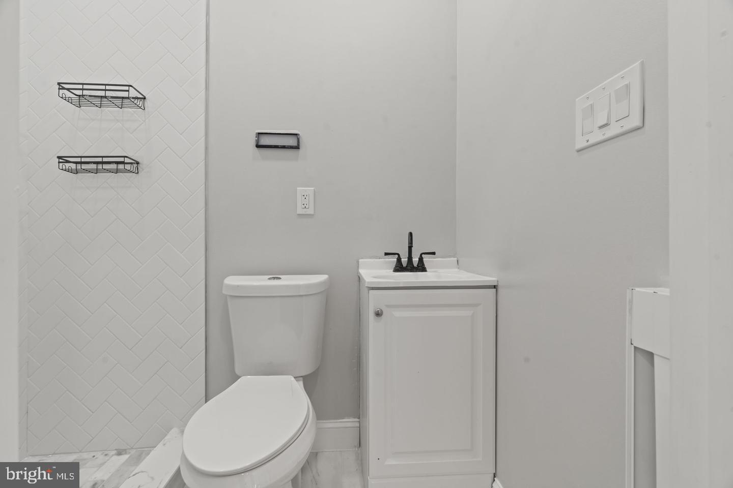 5237 Chester Avenue, Unit 1F Philadelphia, PA 19143 - Photo 27 of 40 Sleek and modern bathroom design.