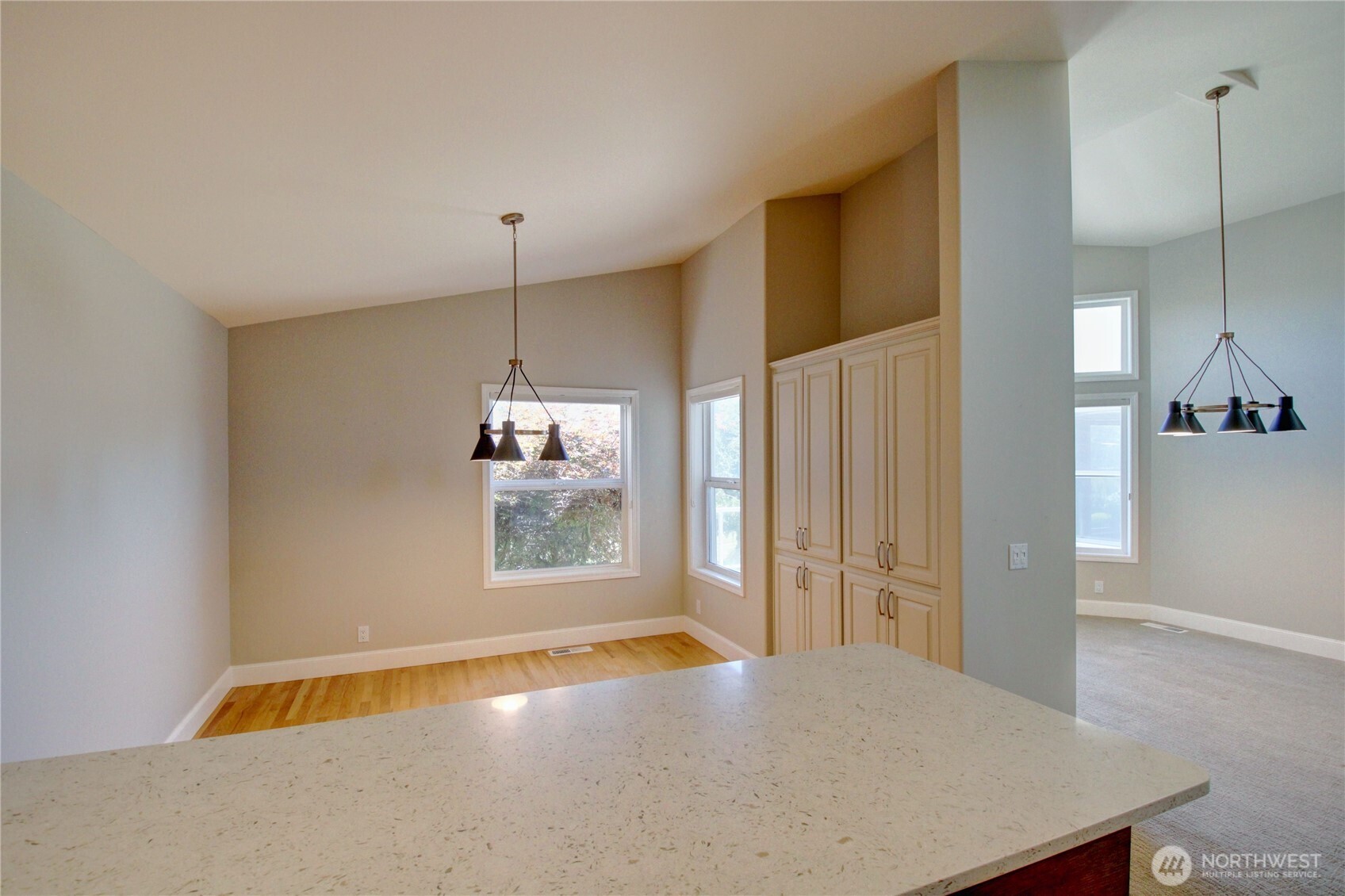 1408 Alpine View Place, Unit 2D Mount Vernon, WA 98274 - Photo 11 of 40 a view of a room with wooden floor and windows