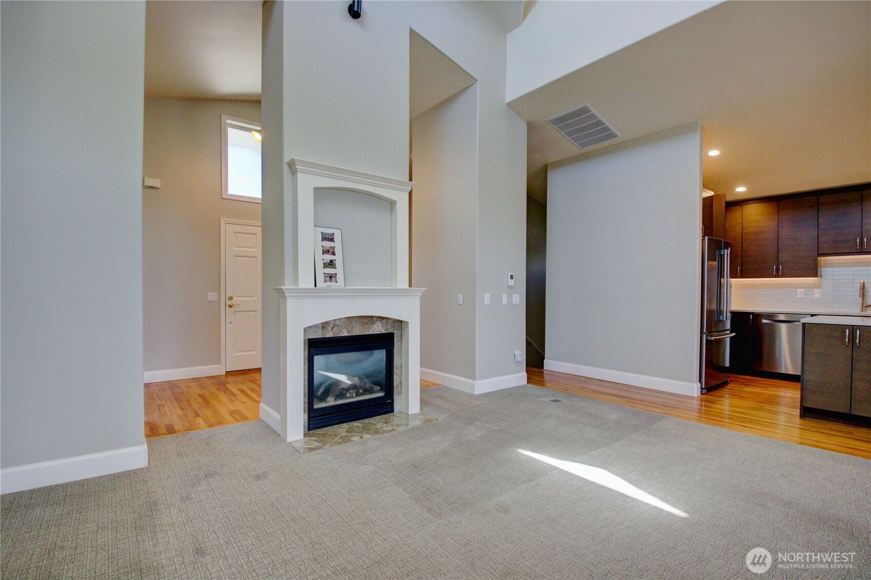 1408 Alpine View Place, Unit 2D Mount Vernon, WA 98274 - Photo 14 of 40 a view of a livingroom with a fireplace