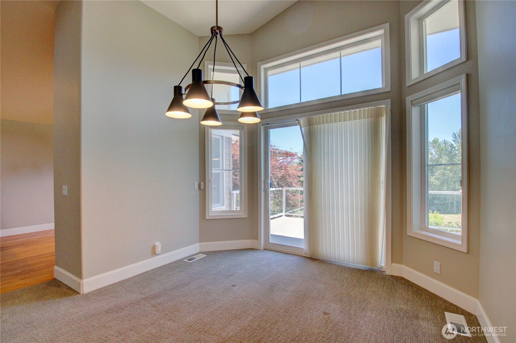 1408 Alpine View Place, Unit 2D Mount Vernon, WA 98274 - Photo 16 of 40 a view of a livingroom with a chandelier