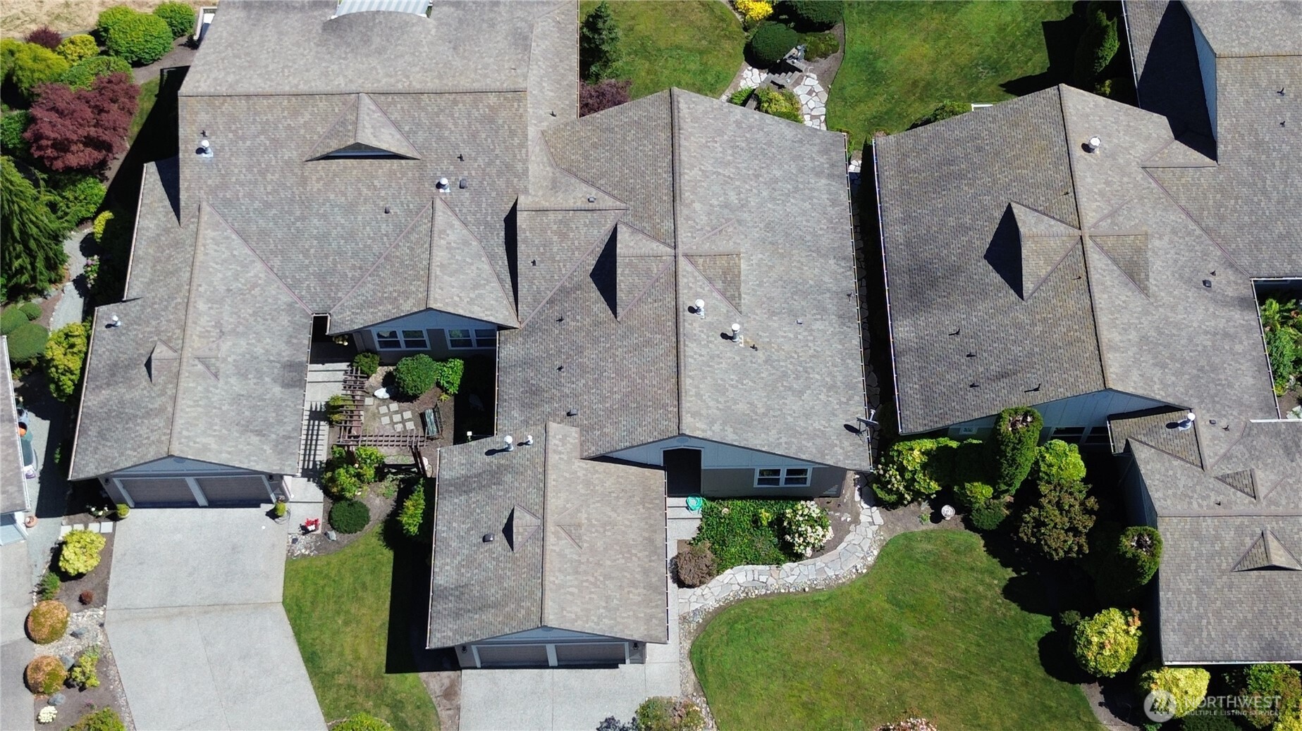 1408 Alpine View Place, Unit 2D Mount Vernon, WA 98274 - Photo 40 of 40 an aerial view of multiple houses with outdoor space
