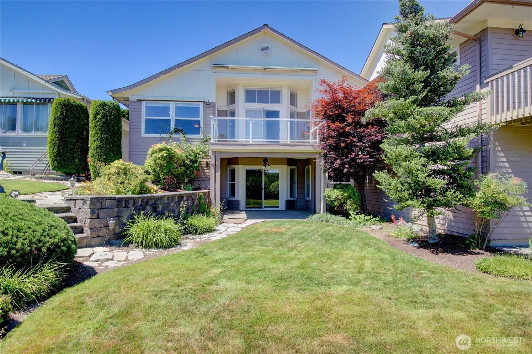 1408 Alpine View Place, Unit 2D Mount Vernon, WA 98274 - Photo 6 of 40 front view of a house with a yard