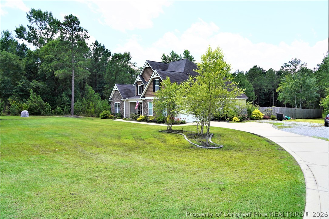 930 Old Vander Road Fayetteville, NC 28312 - Photo 6 of 45 a house with swimming pool in front of it