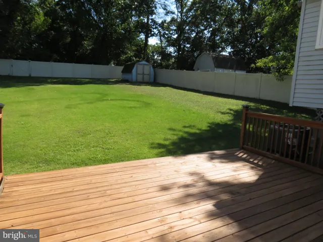 a livingroom with furniture and a window
