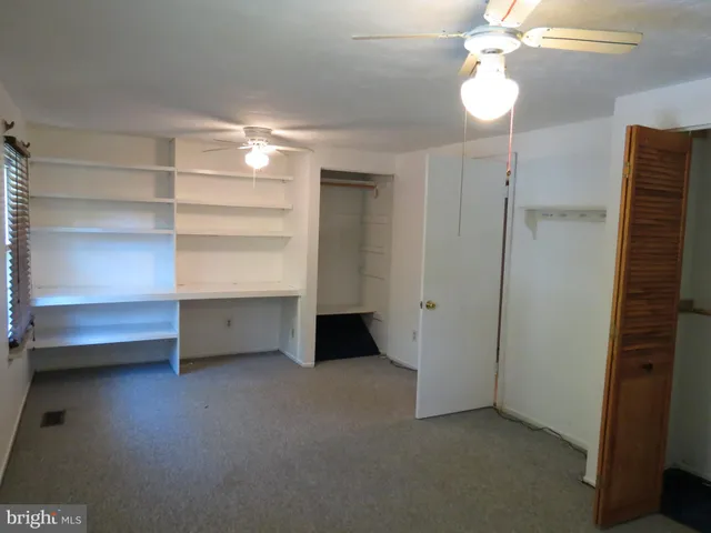a bathroom with a glass door