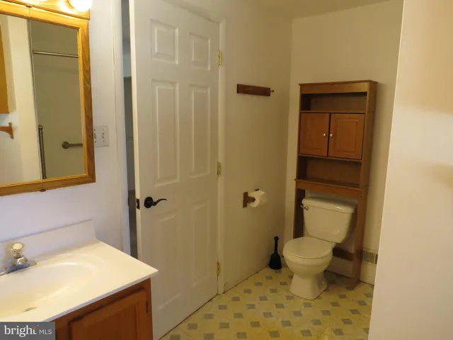 a bathroom with a tub and a shower