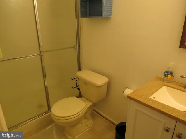 a bathroom with a sink and toilet