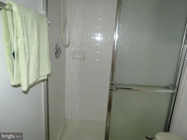 a view of balcony with wooden floor