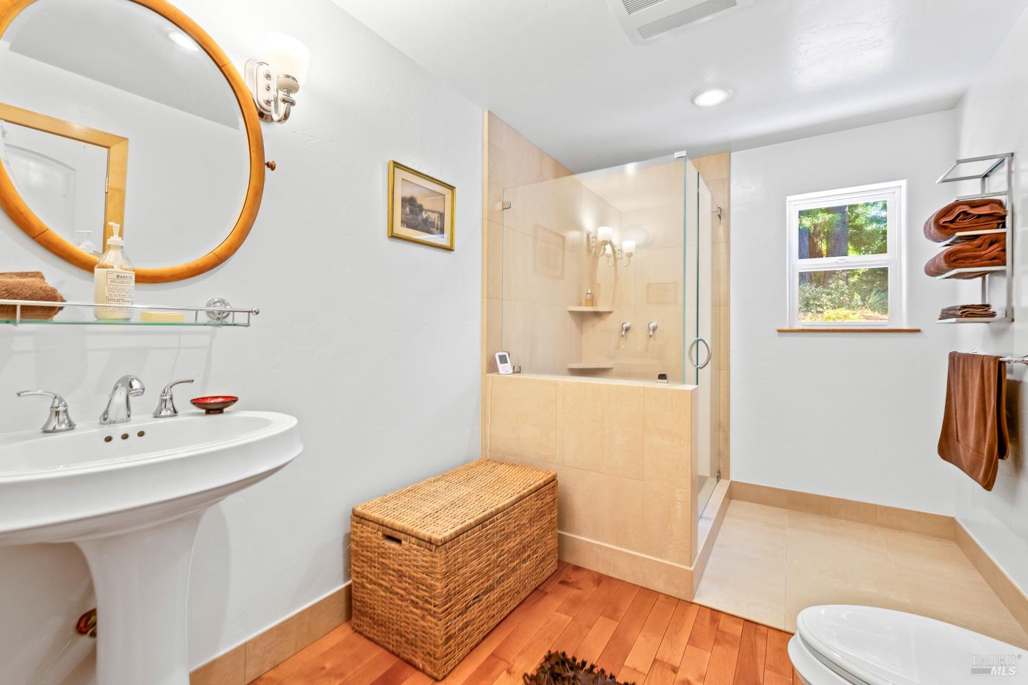 31026 Albion Ridge L Road Albion, CA 95410 - Photo 11 of 40 a bathroom with a sink a toilet and a mirror