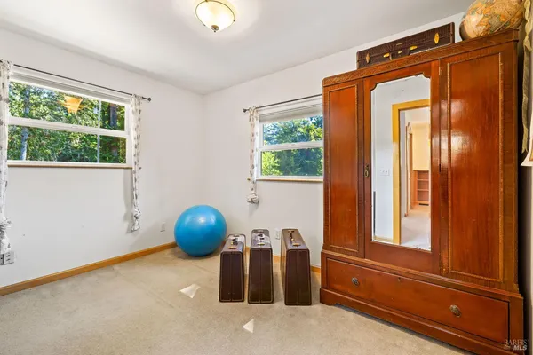 a view of livingroom with furniture and window