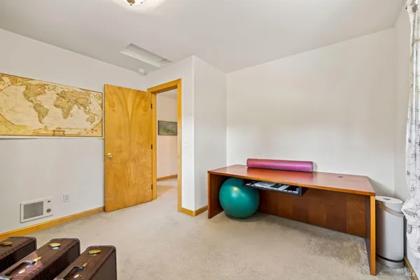 a room with furniture and a window