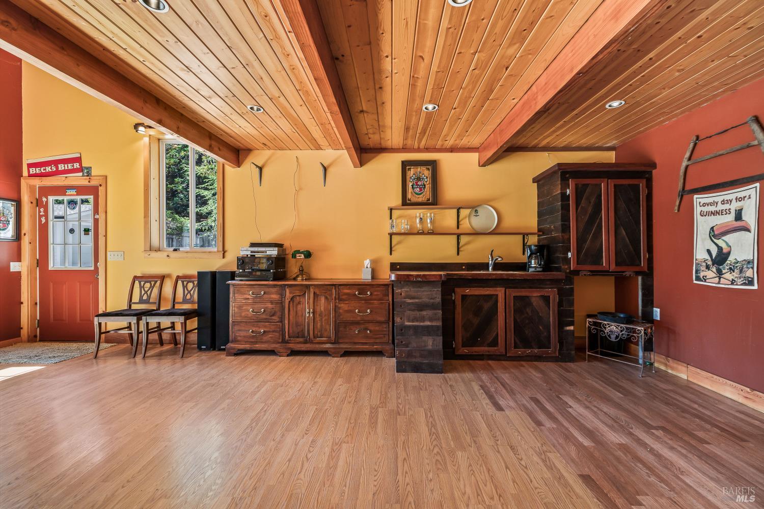31026 Albion Ridge L Road Albion, CA 95410 - Photo 24 of 40 a living room with furniture and wooden floors