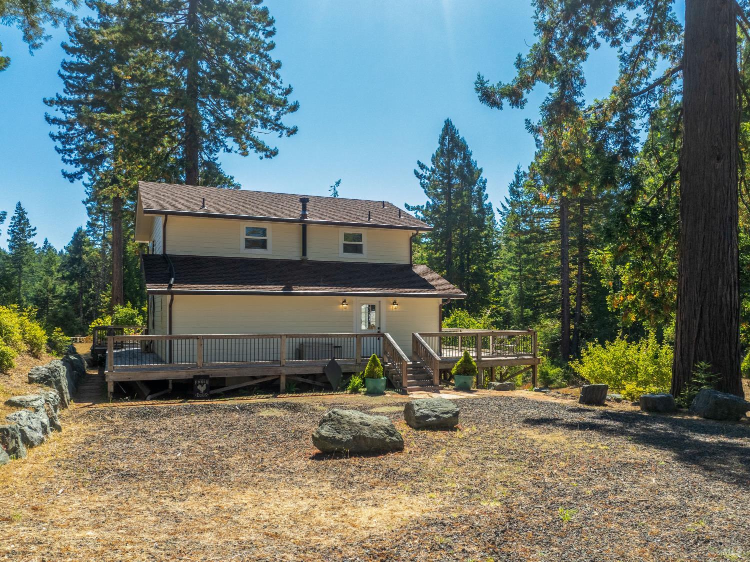 31026 Albion Ridge L Road Albion, CA 95410 - Photo 3 of 40 a front view of a house with a yard