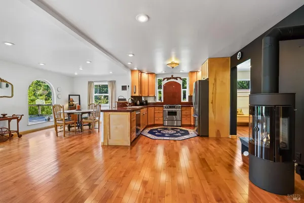 a living room with furniture and a table