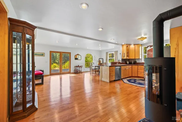 a view of living room filled with furniture and window