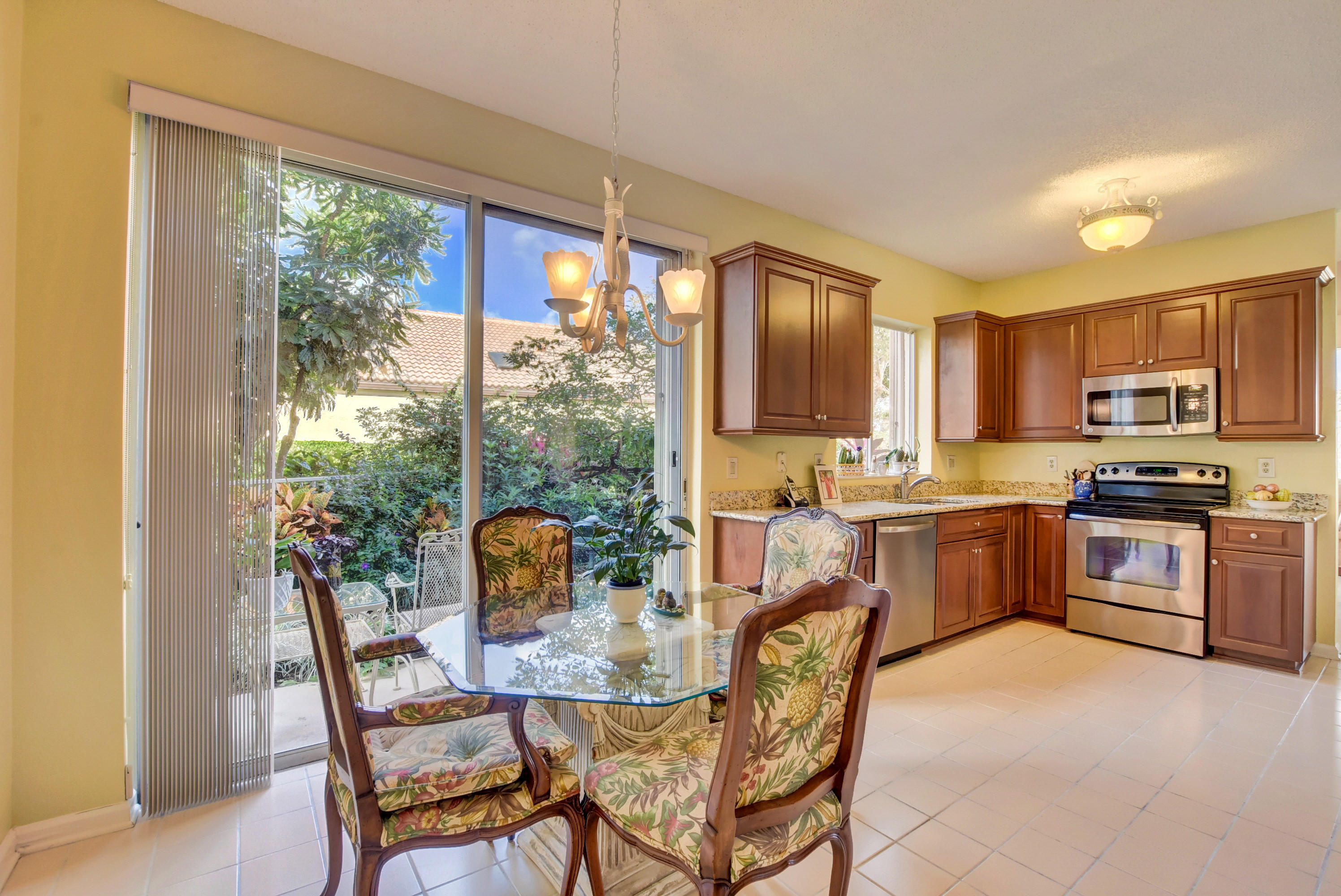 22590 Esplanada Drive Boca Raton, FL 33433 - Photo 23 of 39 breakfast rm w/garden view