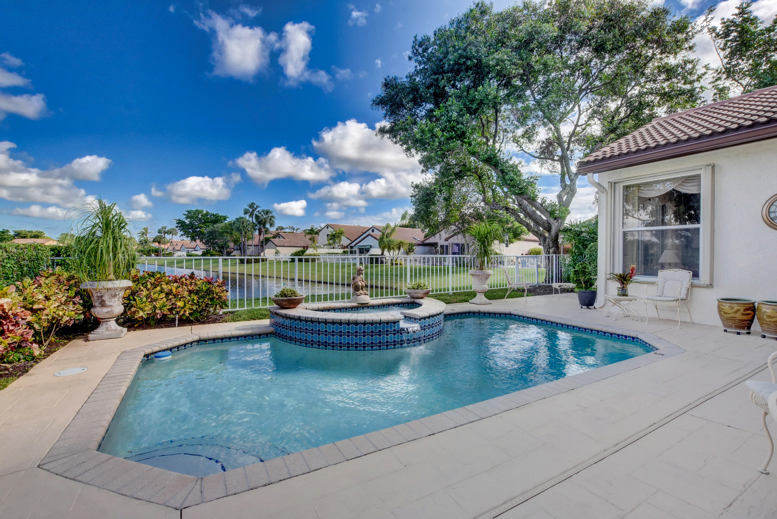 22590 Esplanada Drive Boca Raton, FL 33433 - Photo 30 of 39 pool overlooking lake