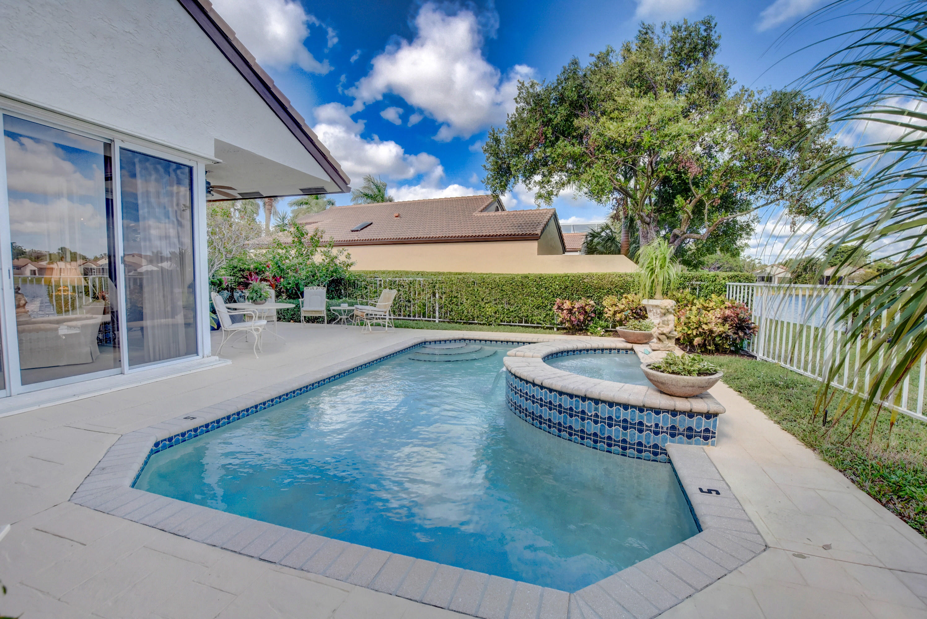 22590 Esplanada Drive Boca Raton, FL 33433 - Photo 32 of 39 Sliding doors off living room