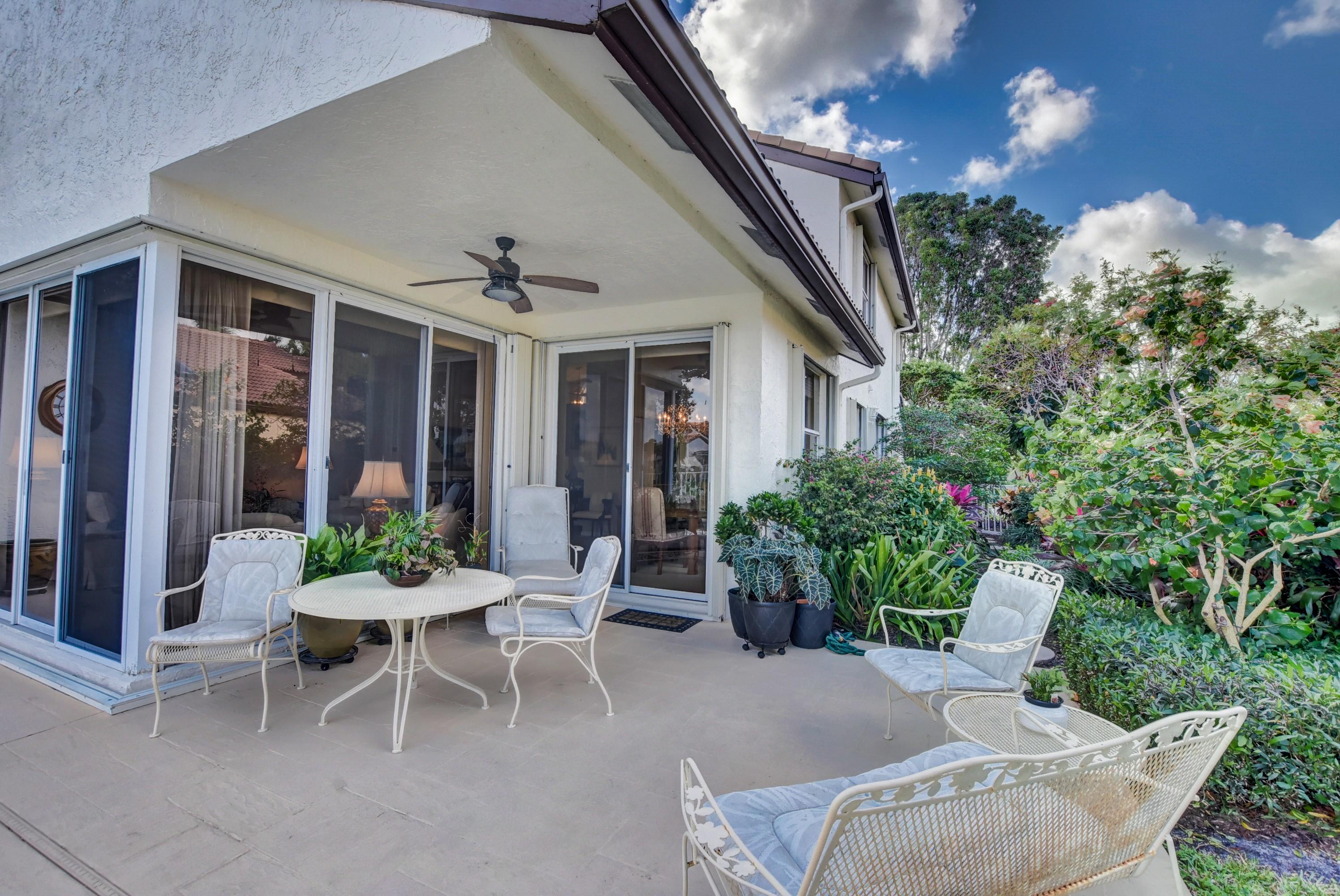 22590 Esplanada Drive Boca Raton, FL 33433 - Photo 36 of 39 covered patio and garden