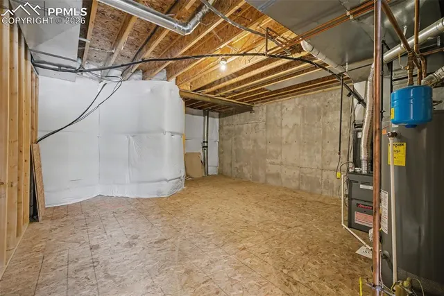 a view of a room with wooden walls