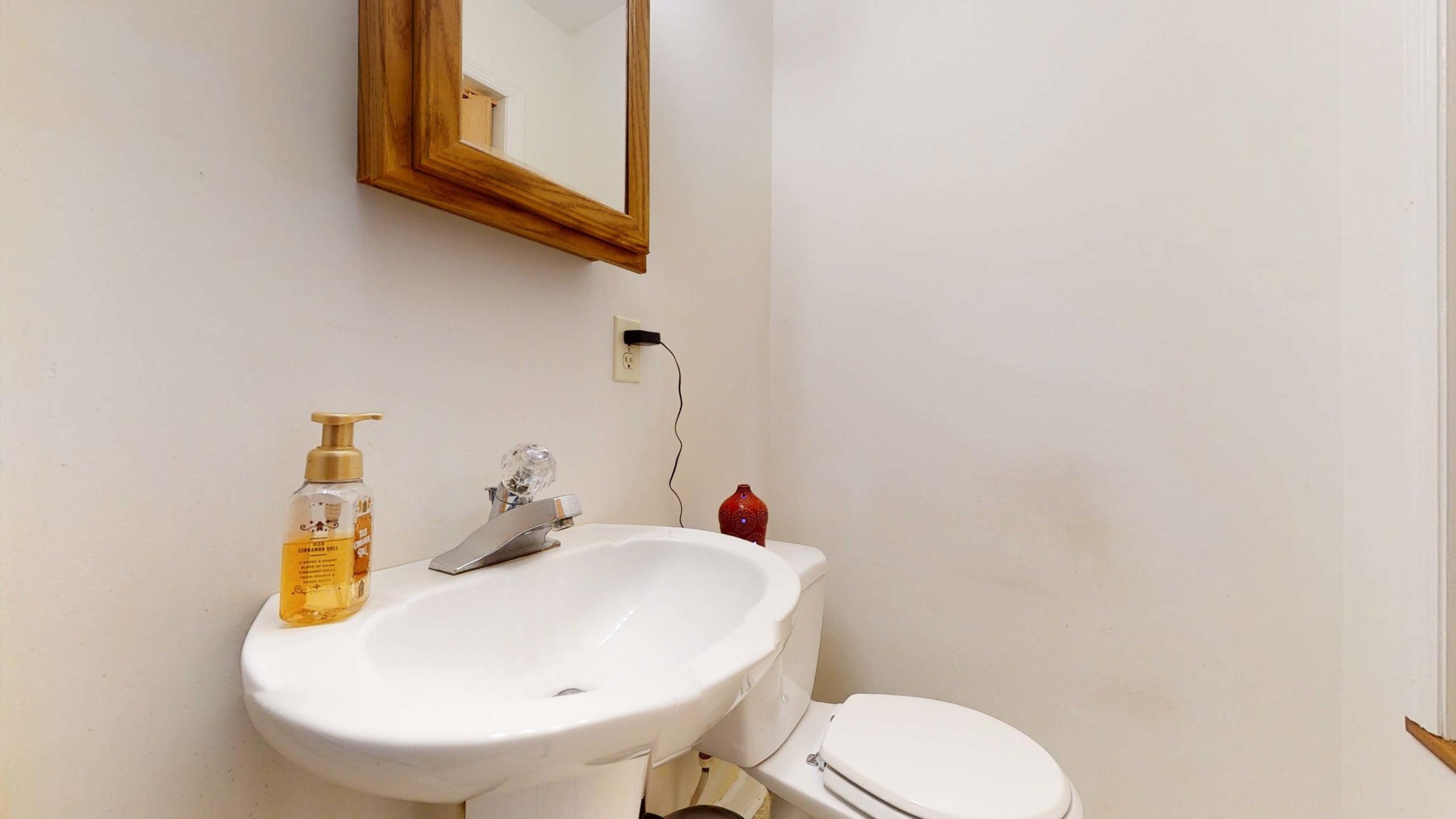 175 Accommodation Road Blaine, TN 37709 - Photo 14 of 30 a bathroom with a toilet sink and mirror