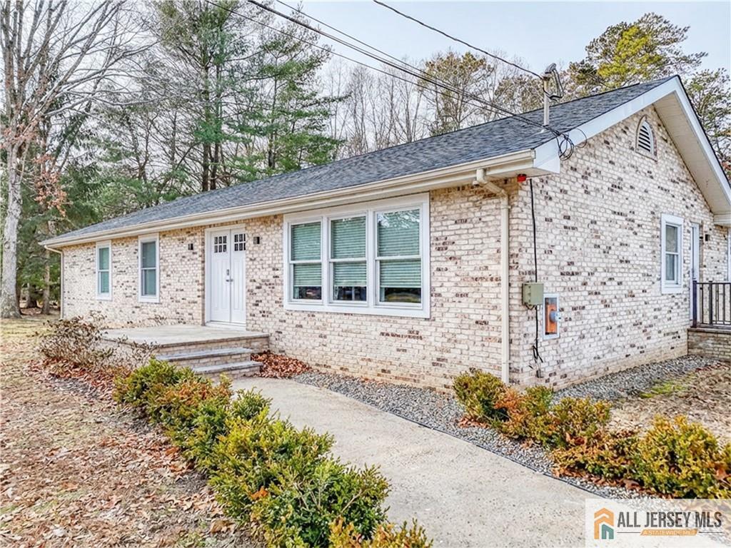 176 Old Forge Road Monroe Township, NJ 08831 - Photo 1 of 36 front view of a house with a yard