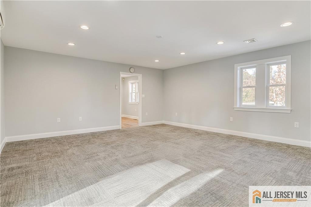 176 Old Forge Road Monroe Township, NJ 08831 - Photo 11 of 36 a view of an empty room with a window