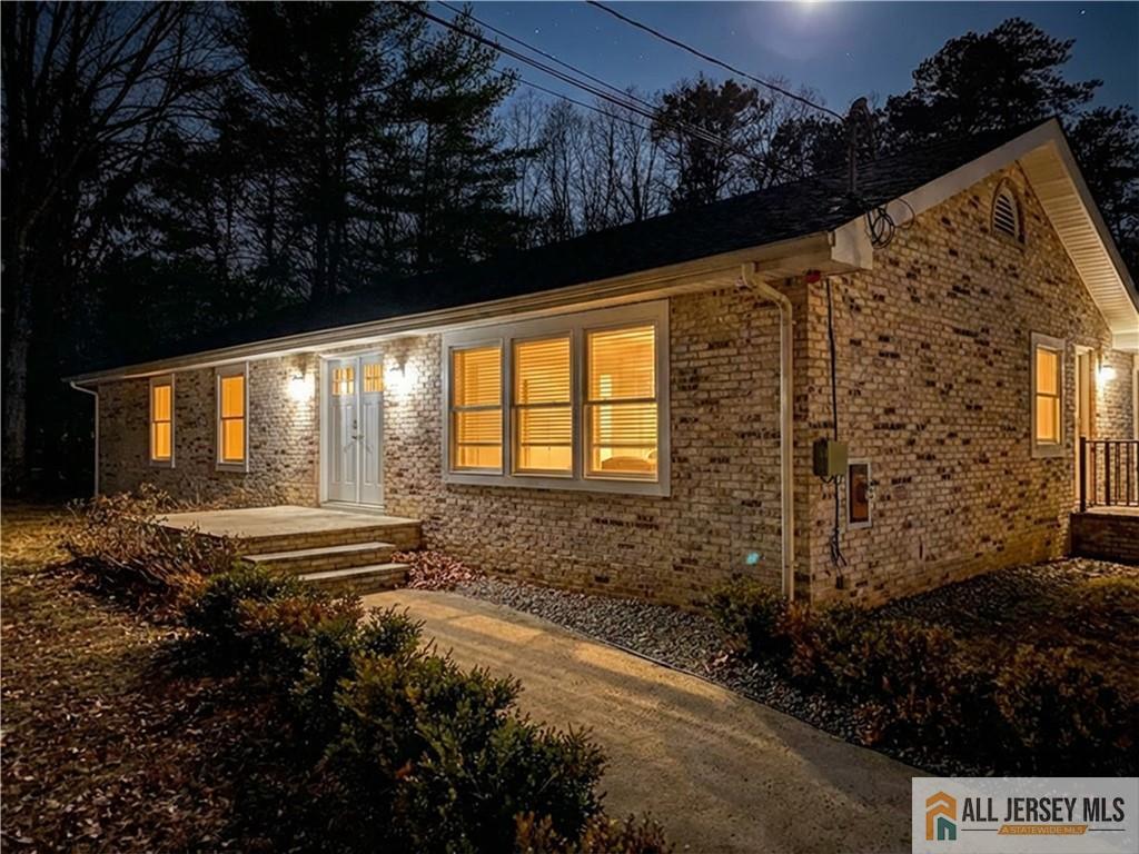 176 Old Forge Road Monroe Township, NJ 08831 - Photo 2 of 36 a front view of a house with a yard