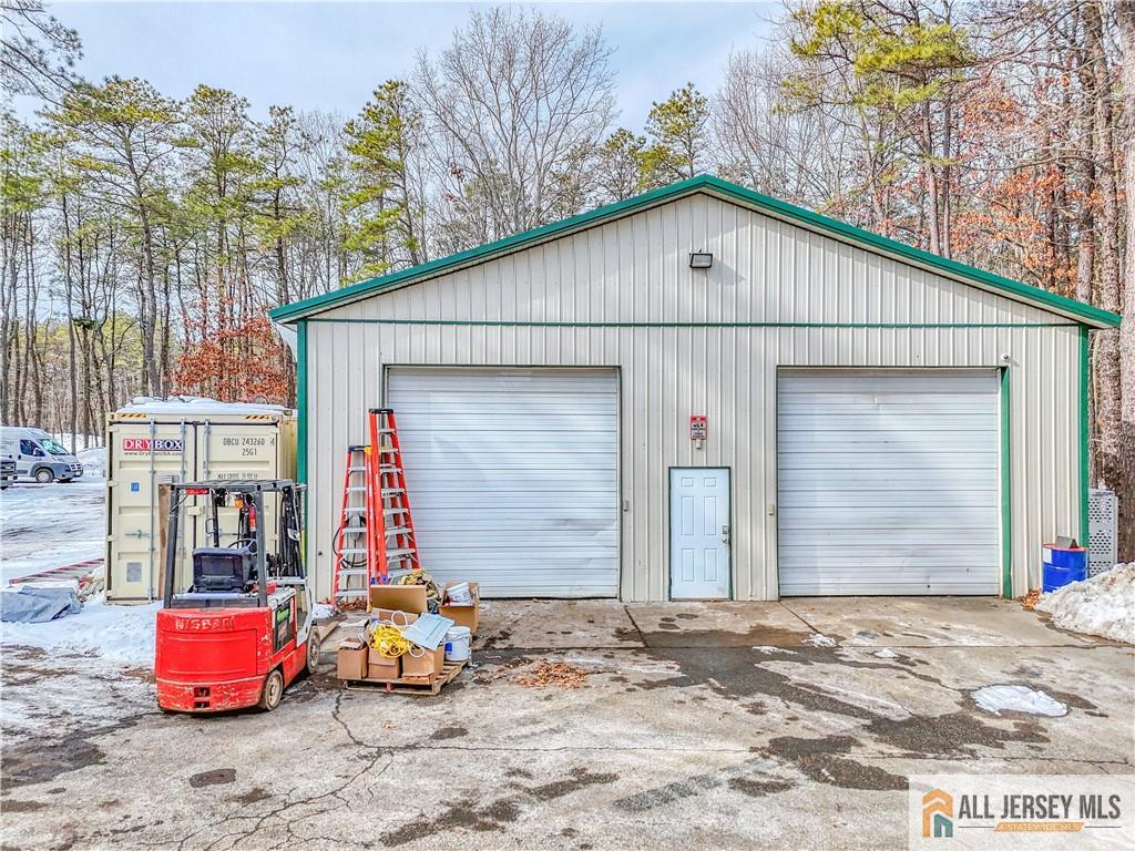 176 Old Forge Road Monroe Township, NJ 08831 - Photo 30 of 36 a small white house with a outdoor space