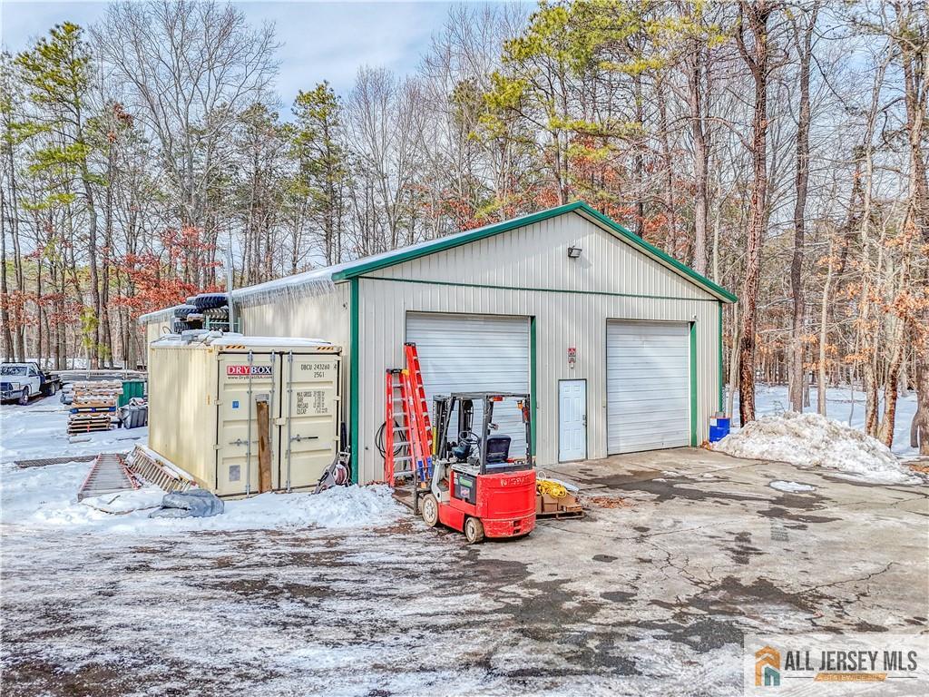 176 Old Forge Road Monroe Township, NJ 08831 - Photo 33 of 36 a view of a house with wooden fence