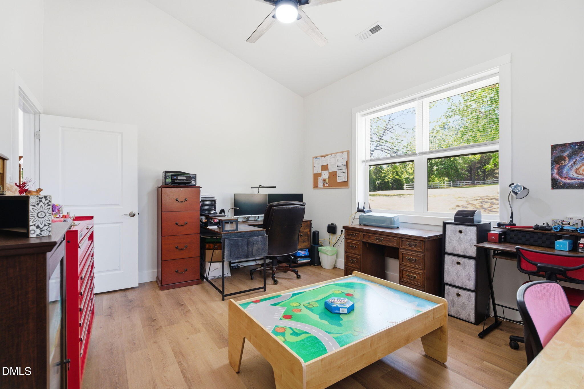 5416 Pulley Town Road Zebulon, NC 27597 - Photo 66 of 74 a view of a workspace with furniture and a window