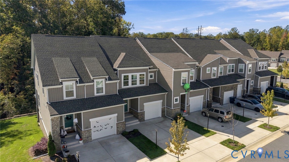 12824 Deep Wl Road Midlothian, VA 23112 - Photo 2 of 42 Townhome exterior featuring gray siding, stone acc
