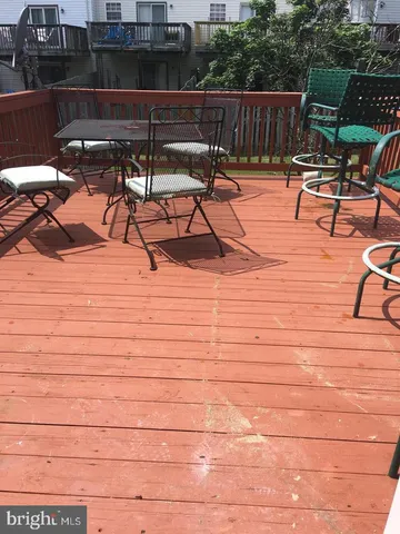 a view of a terrace with furniture