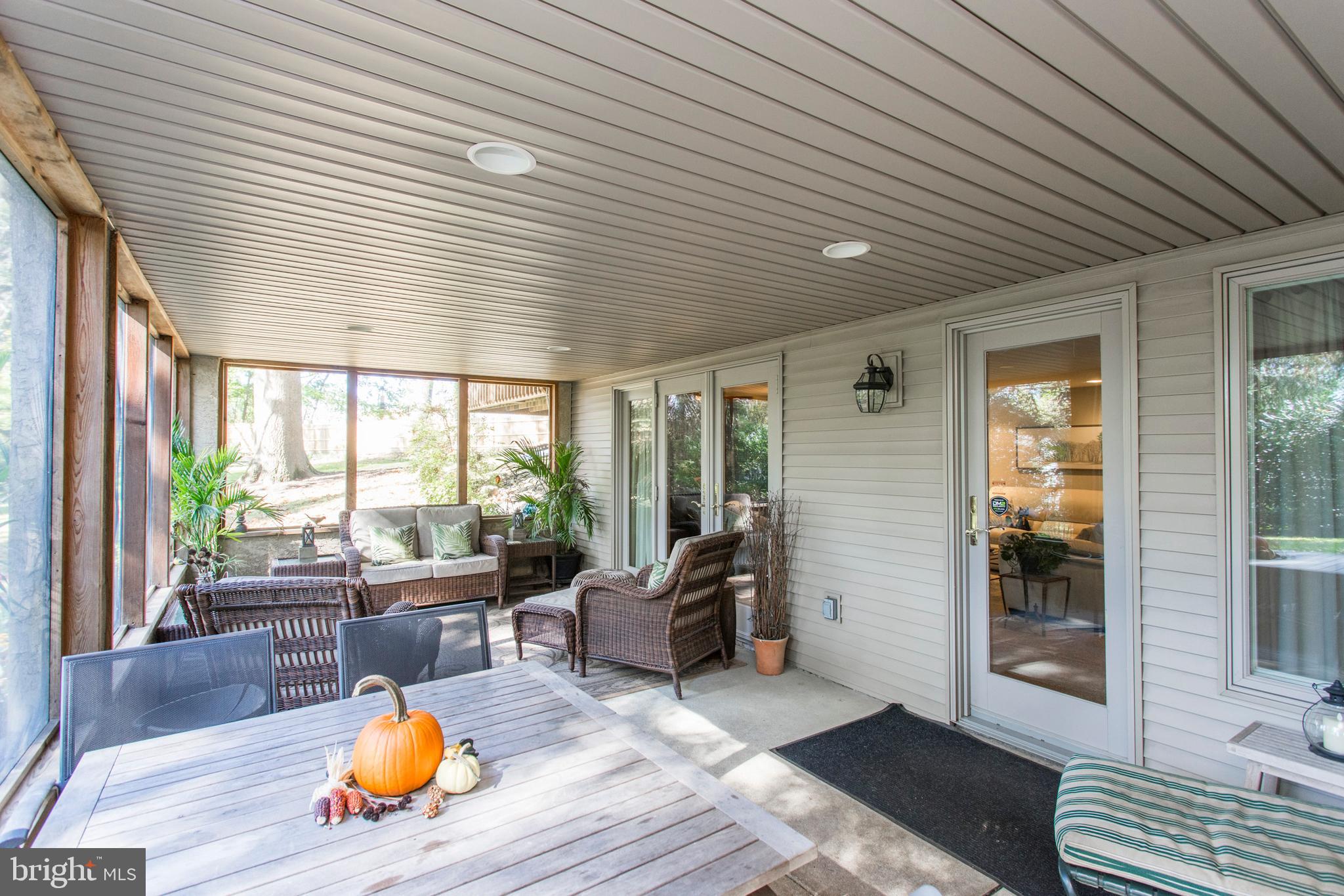 651 Church Road Flourtown, PA 19031 - Photo 23 of 29 Large screened in porch off family room.