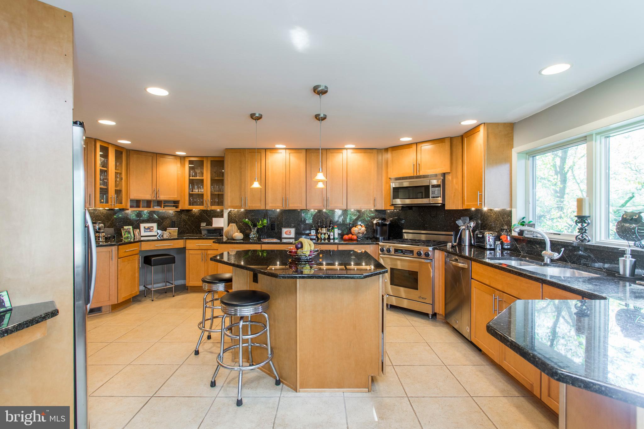 651 Church Road Flourtown, PA 19031 - Photo 10 of 29 Recessed lighting and beautiful maple cabinets.